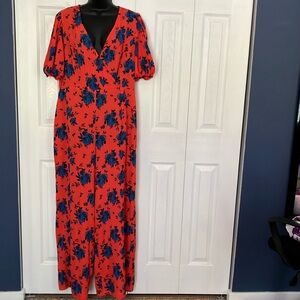 ASOS DESIGN bubble crepe v neck puff sleeve jumpsuit in floral print.